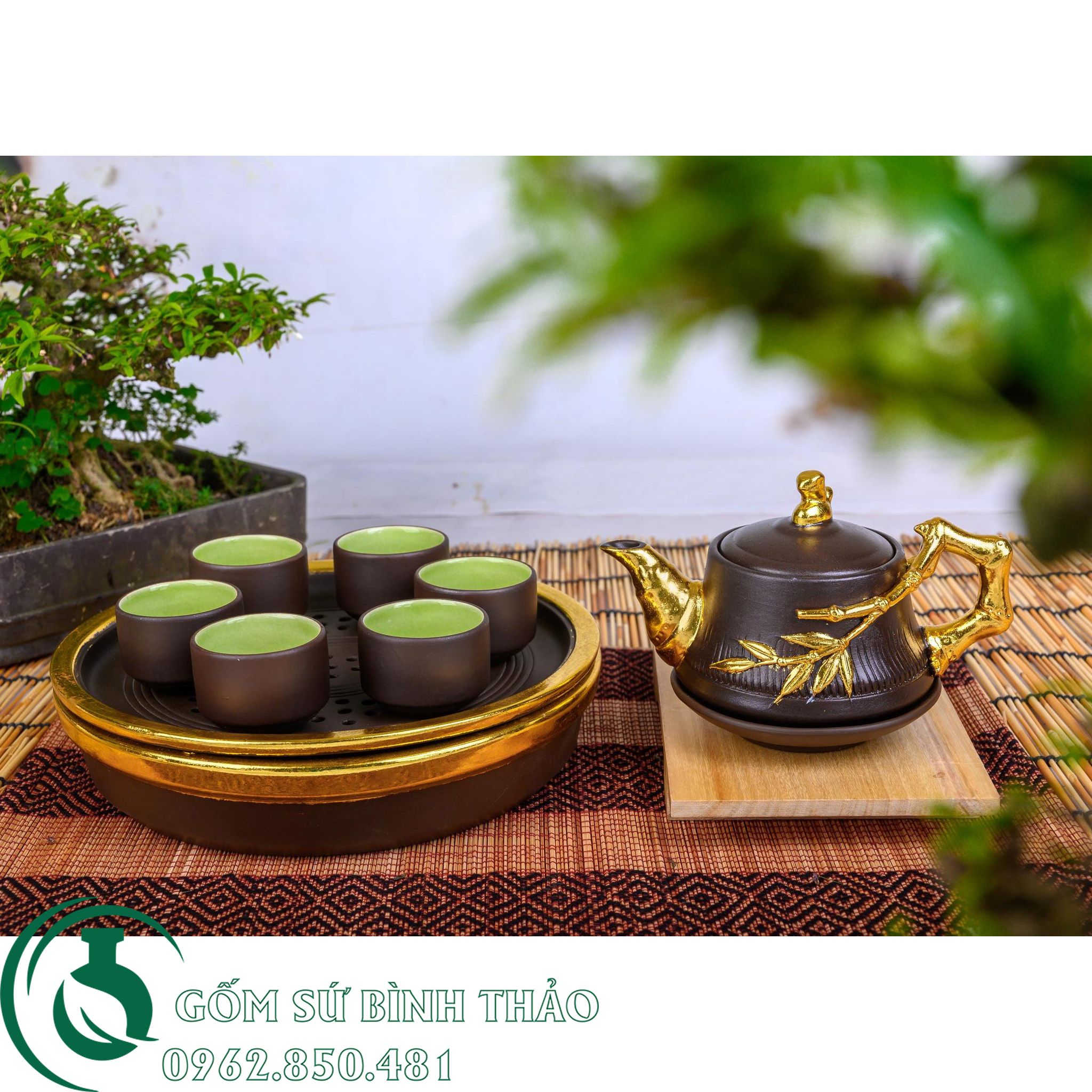 Bộ ấm trà nhỡ dát vàng 18k tử sa Bát Tràng