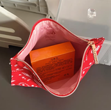 Túi Đựng Mỹ Phẩm Clarins Họa Tiết Đỏ 22x16cm