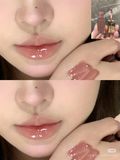 Son Nars Lip Gloss màu Nympho Fullsize