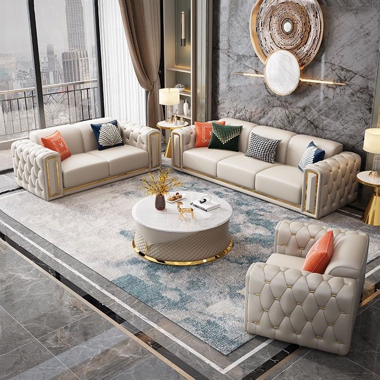 Bộ sofa da màu kem, viền inox mạ vàng BSF155