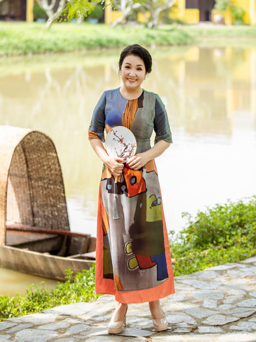 Đầm cổ tròn 2 tà họa tiết, tay loe