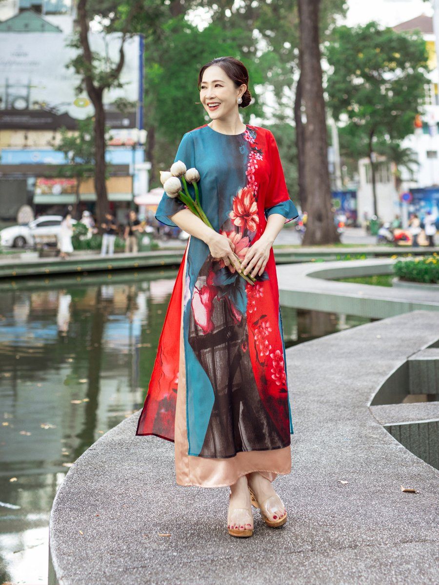 Đầm cổ tròn 2 tà họa tiết, tay loe