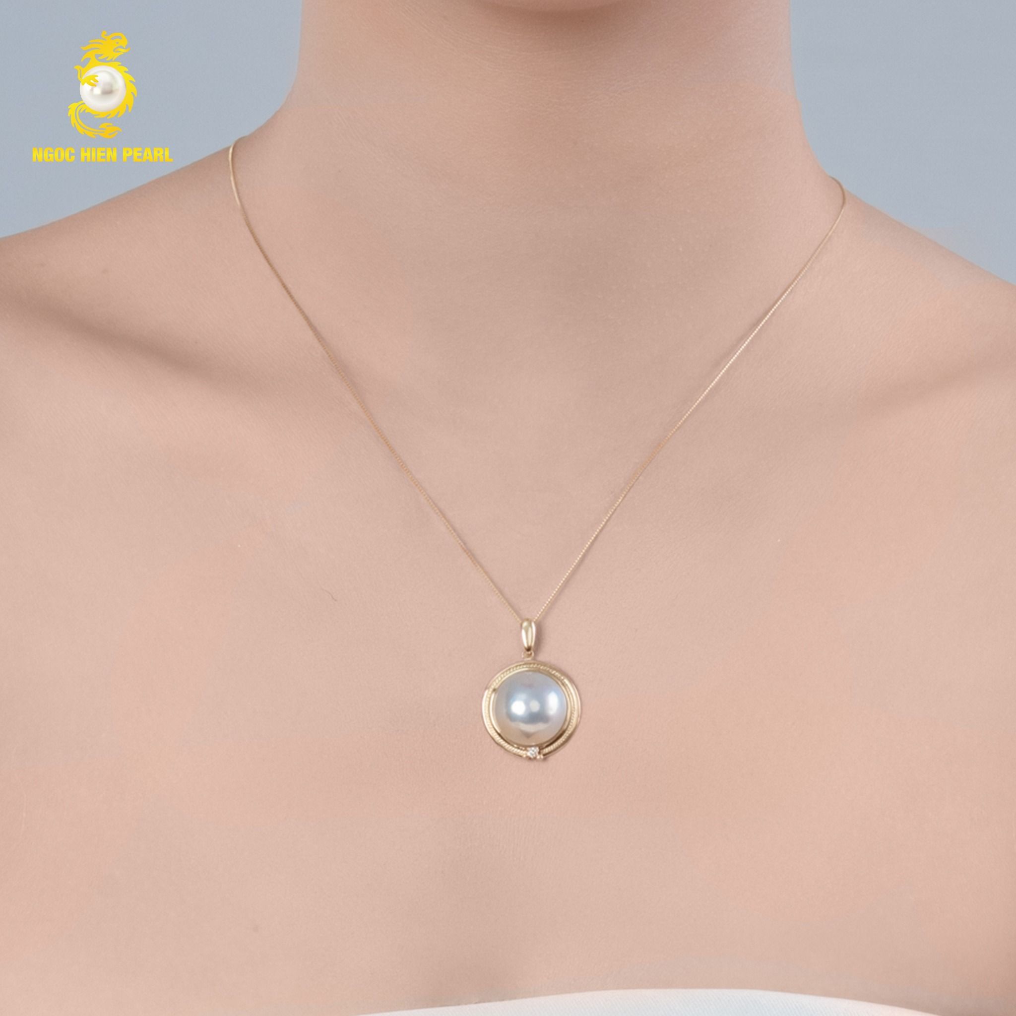 Mặt dây chuyền vàng ngọc trai cấy trên vỏ GPP020