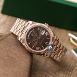 Đồng Hồ Rolex Day-Date 40mm 228235 Rep 1:1 Chế Tác Vỏ Vàng Hồng Mặt Nâu Chocolate Cọc Số La Mã Trọng Lượng 168 Gram Dây Kim Loại