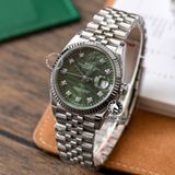 Đồng Hồ Rolex Datejust 36mm 126234-0055 Rep 1:1 Chế Tác Vỏ Bạc Mặt Lá Cọ Xanh Lá Cọc Số Đính Đá Dây Kim Loại Jubilee