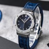 Đồng Hồ Hublot Classic Fusion 33mm Rep 1:1 Chế Tác Vỏ Bạc Mặt Số Xanh Dương 581.NX.7170.LR