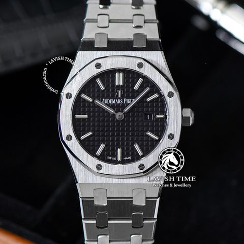 Đồng Hồ Audemars Piguet Royal Oak 67650ST.OO.1261ST.01 Rep 1:1 Chế Tác Vỏ Bạc Mặt Đen Dây Kim Loại