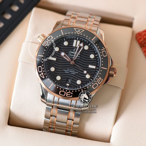 Đồng Hồ Omega Seamaster Diver 300M Co‑Axial Master Chronometer 42 mm 210.20.42.20.01.001 Rep 1:1 Chế Tác Vỏ Demi Vàng Hồng Mặt Đen Dây Kim Loại