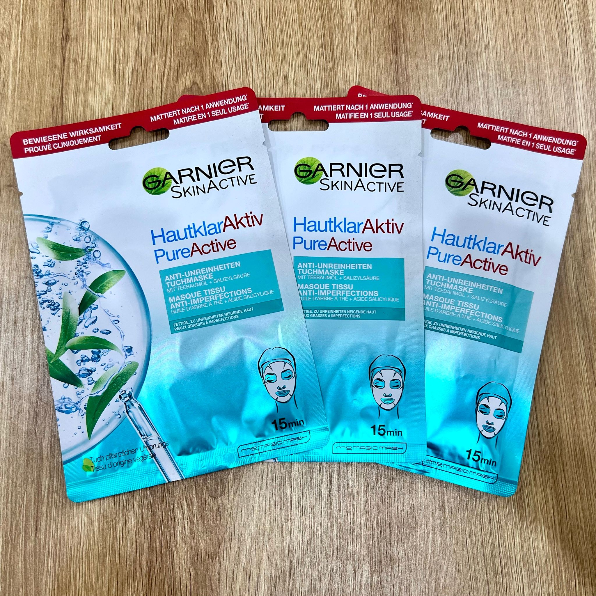 Mặt nạ giấy Garnier SkinActive Hautklar Aktiv - Làm sạch sâu & dịu da dầu mụn 28g