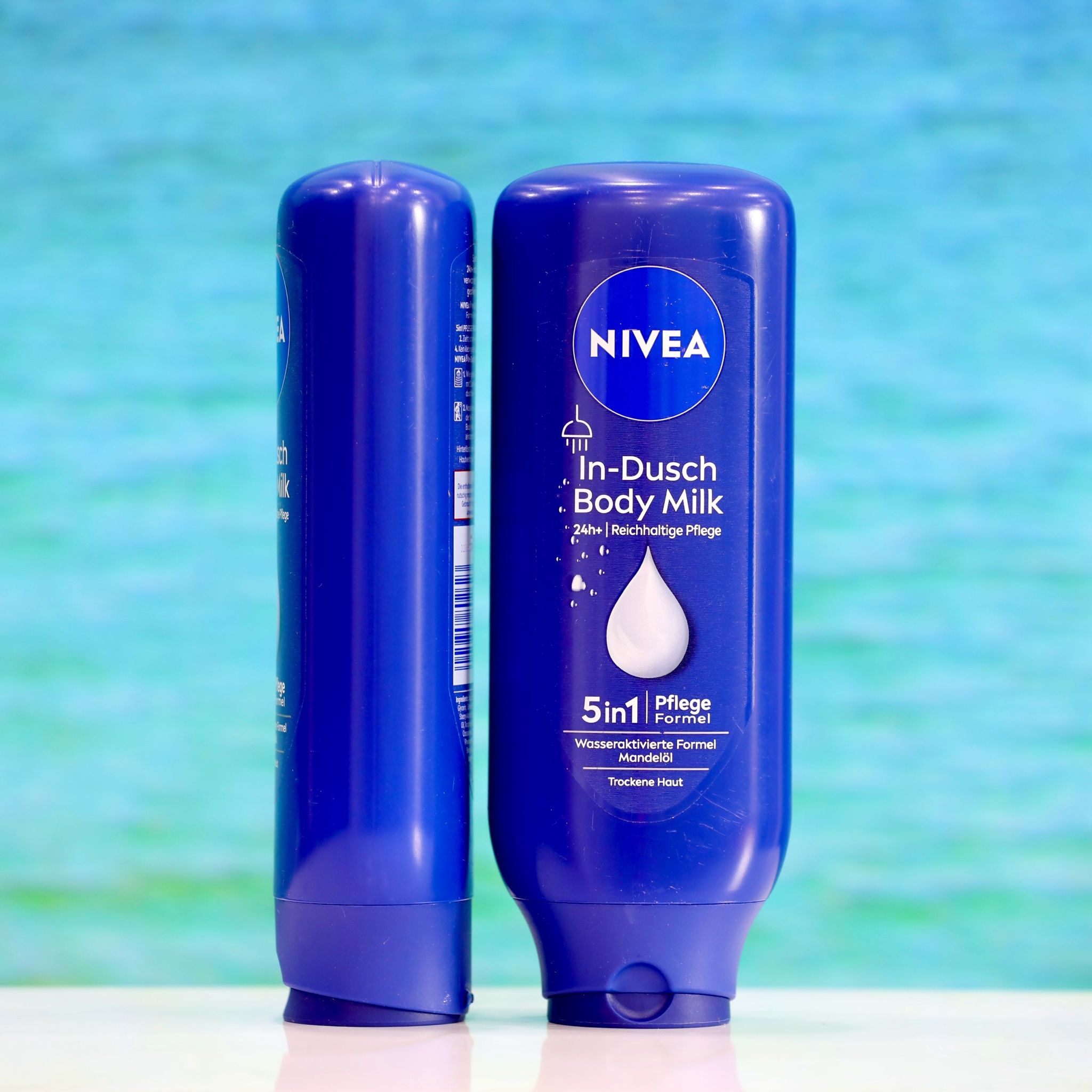 Kem xả dưỡng thể Nivea In-dusch Body Milk cho thường và da khô, chai 400ml
