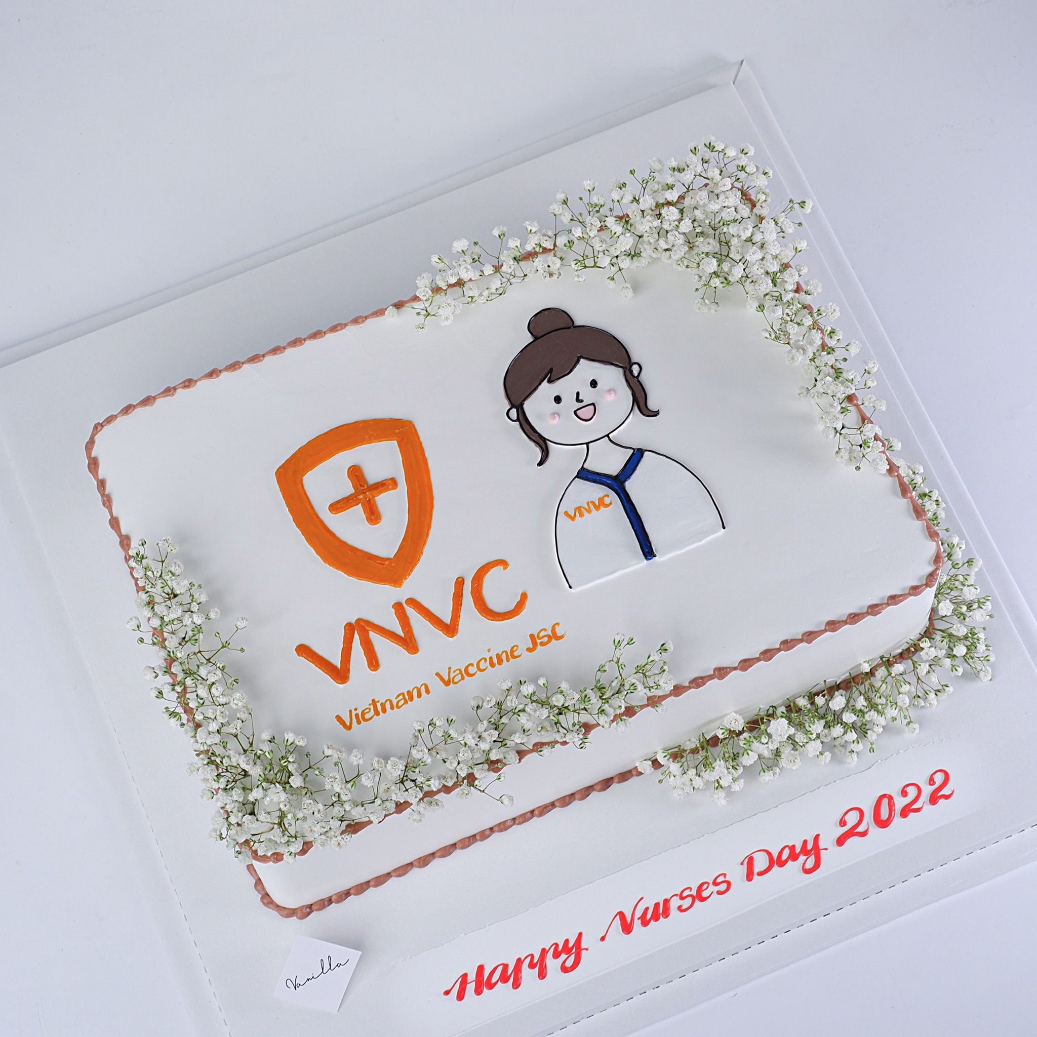 Bánh vẽ logo, cô gái - Bánh kem công ty Đà Nẵng