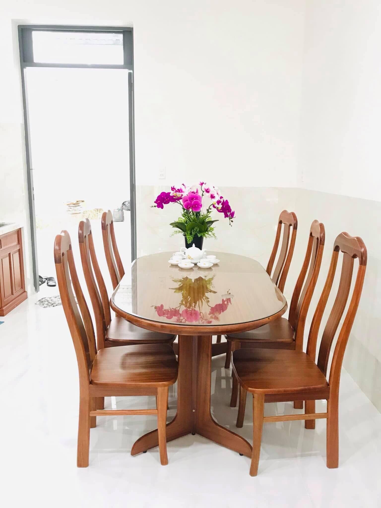 BỘ BÀN ĂN OVAL 1M6 + 6 GHẾ ĐẦU BÒ