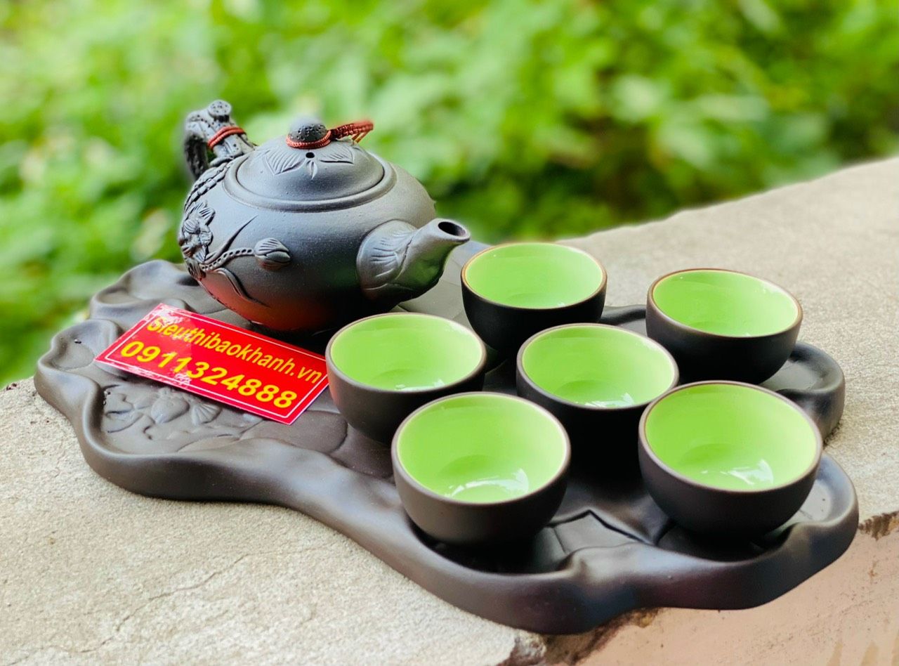 bộ ấm chén tử xa chạm khắc hoa văn