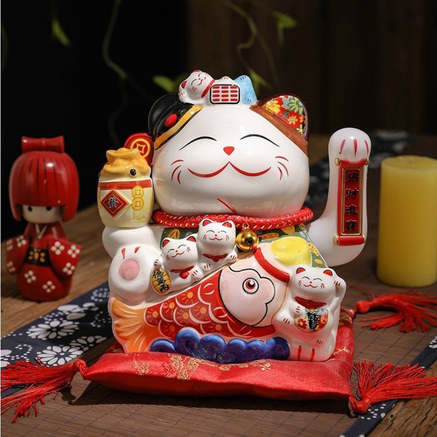 Mèo thần tài vàng Buôn May Bán Đắt