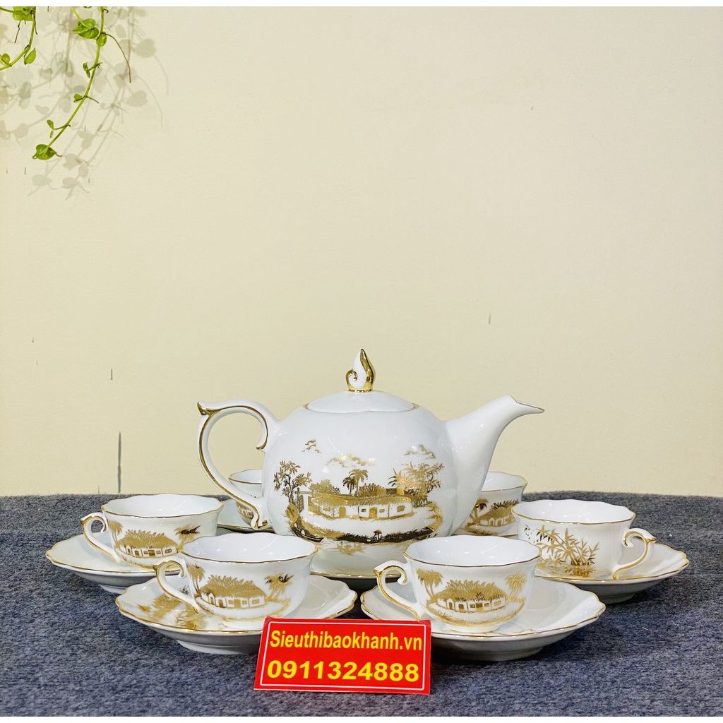 Bộ ấm chén men trắng vẽ vàng Bát