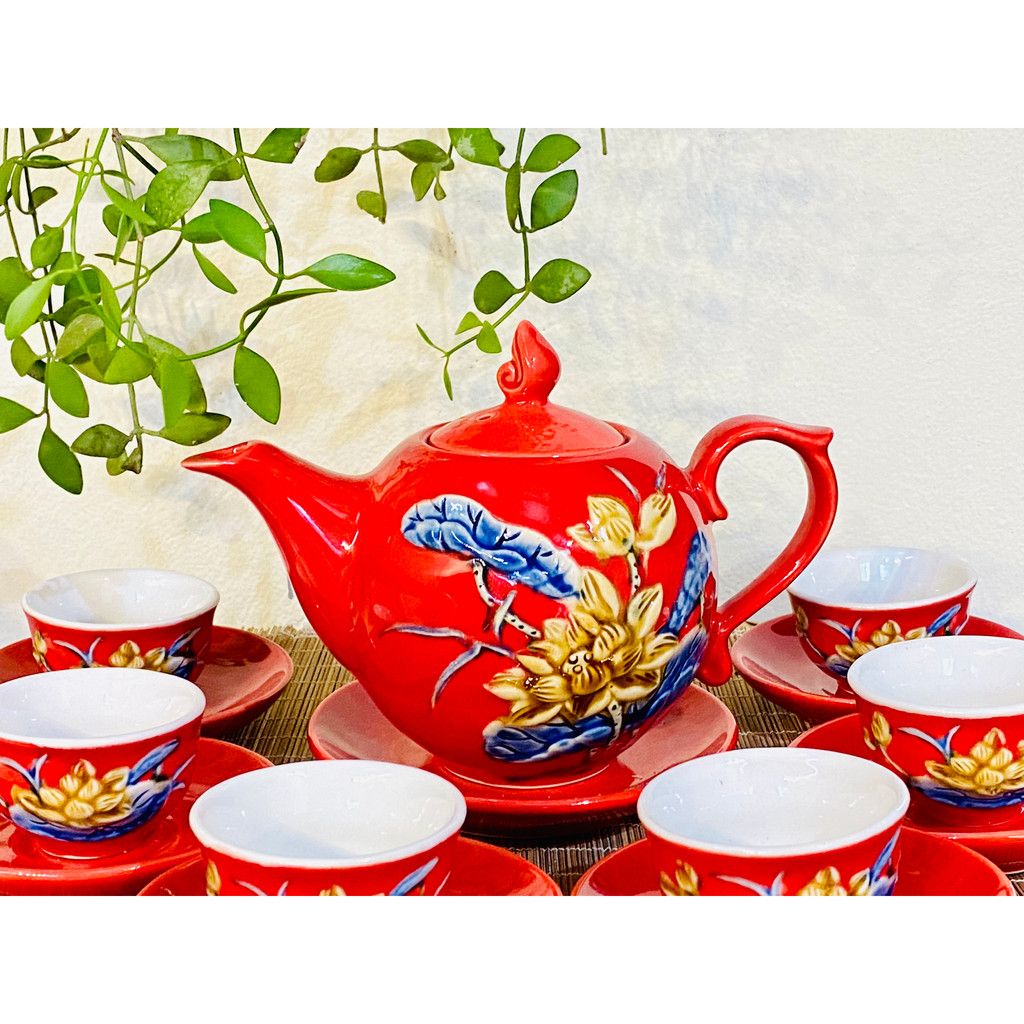 Bộ ấm chén men đỏ vẽ bông sen nổi độc đáo