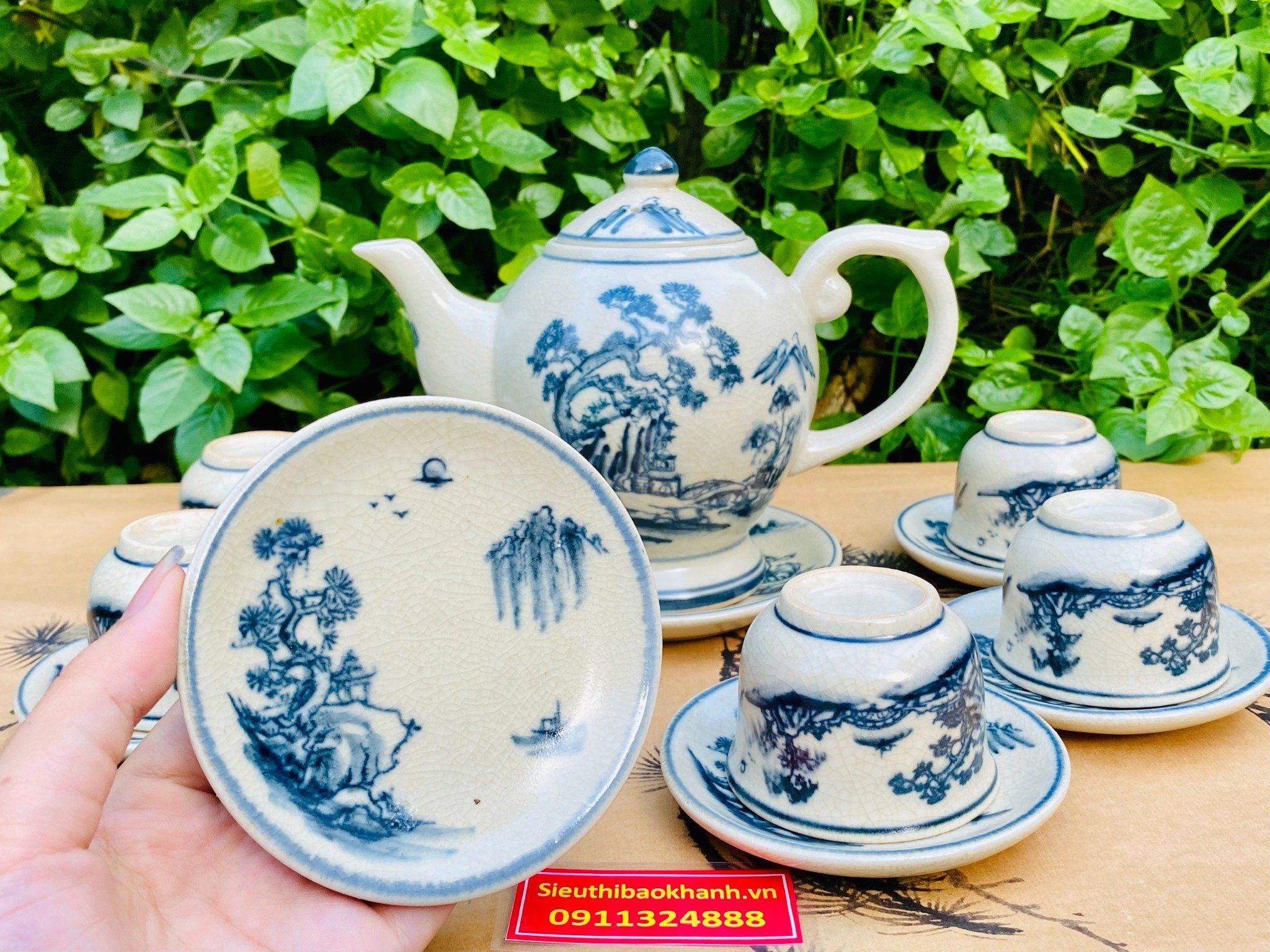 Bộ ấm chén men rạn sơn thủy