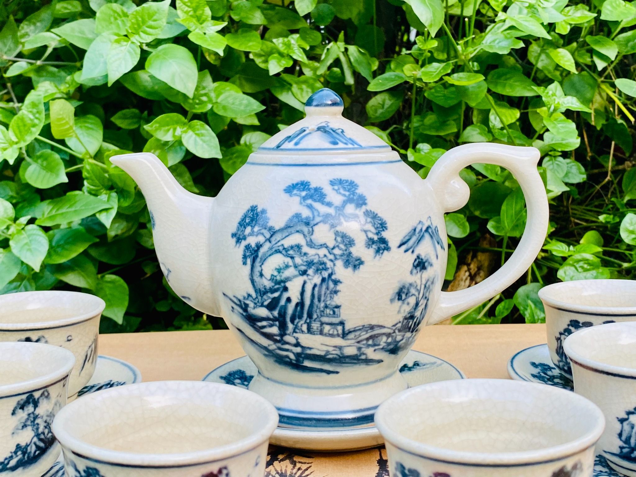 Bộ ấm chén men rạn sơn thủy