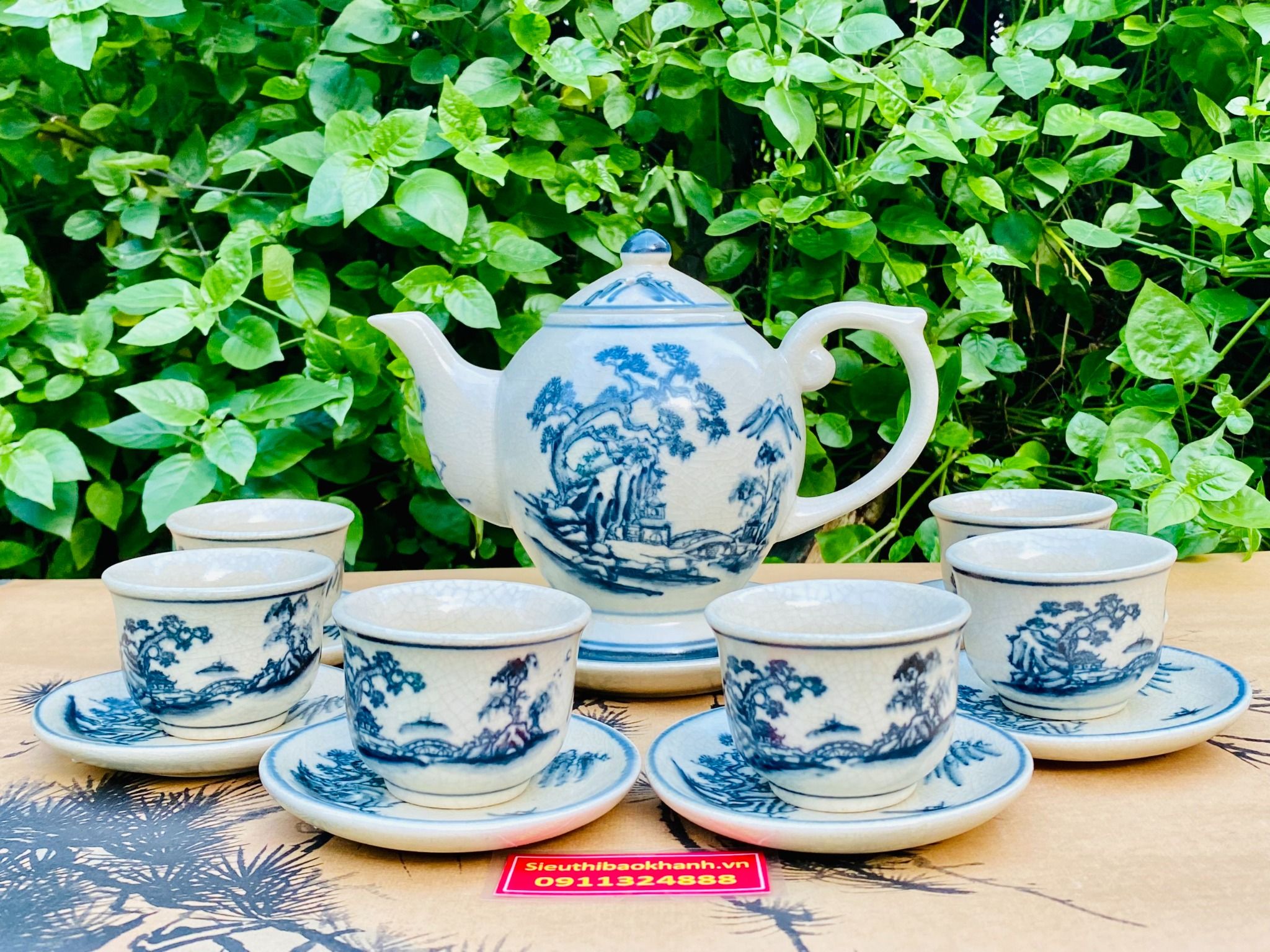 Bộ ấm chén men rạn sơn thủy