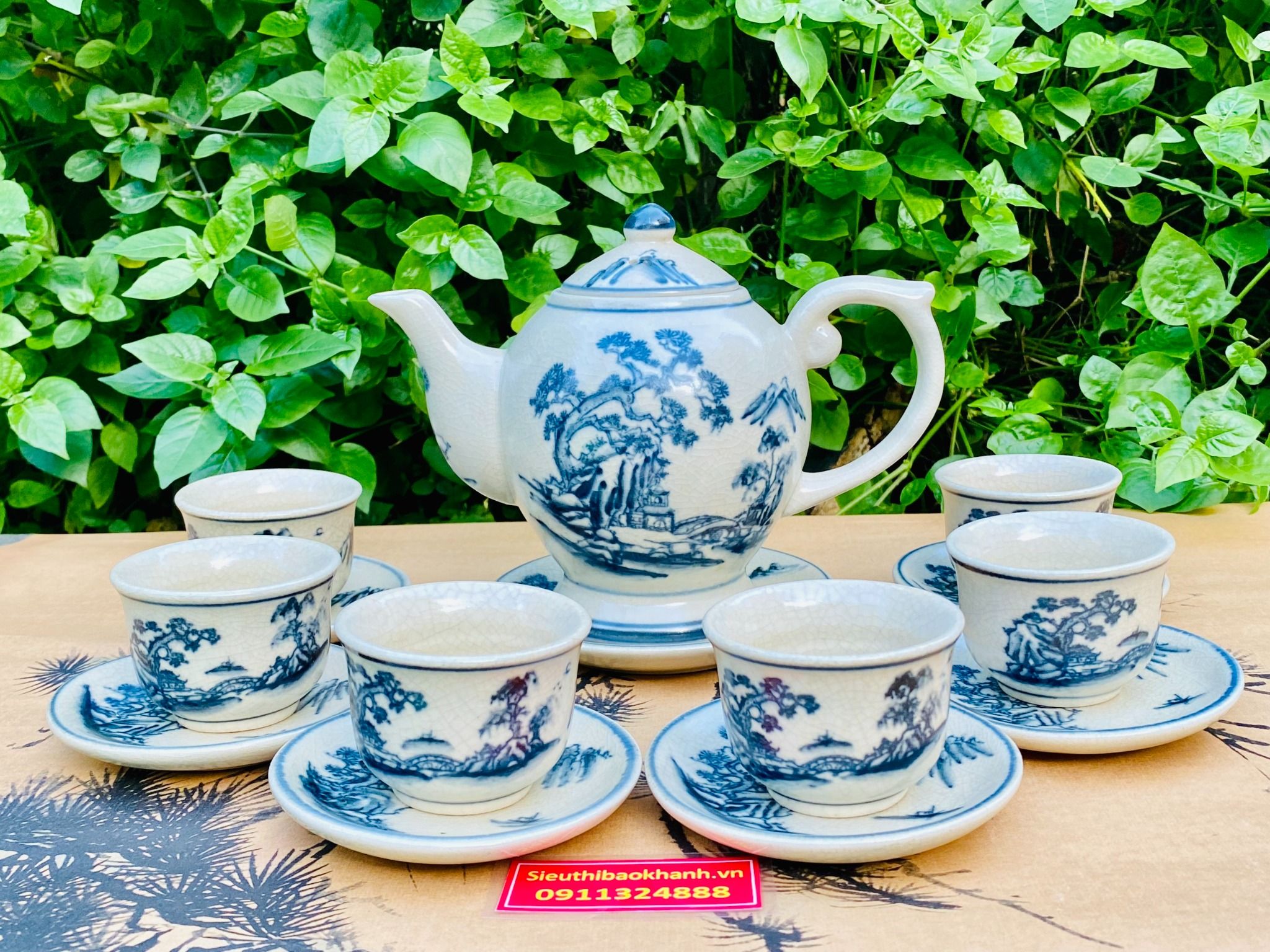 Bộ ấm chén men rạn sơn thủy