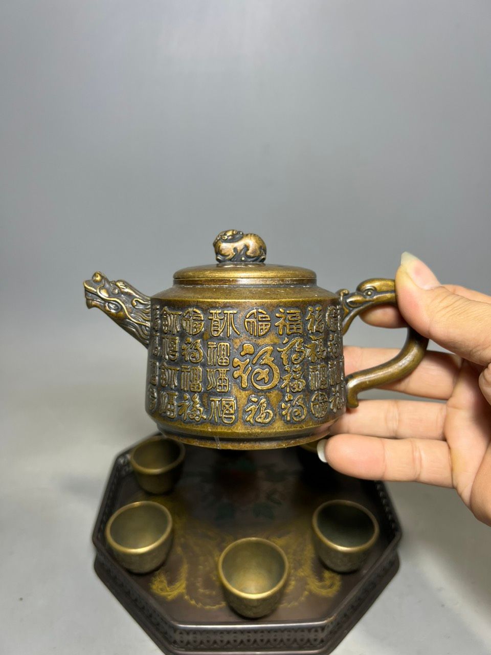 Bộ ấm chén trà đồng chạm khắc rồng phượng