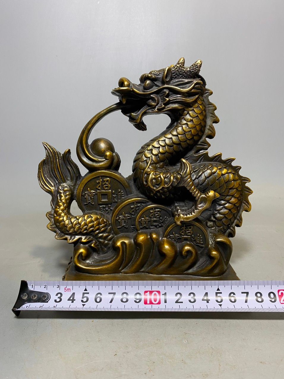 RỒNG QUẤN KIM TIỀN