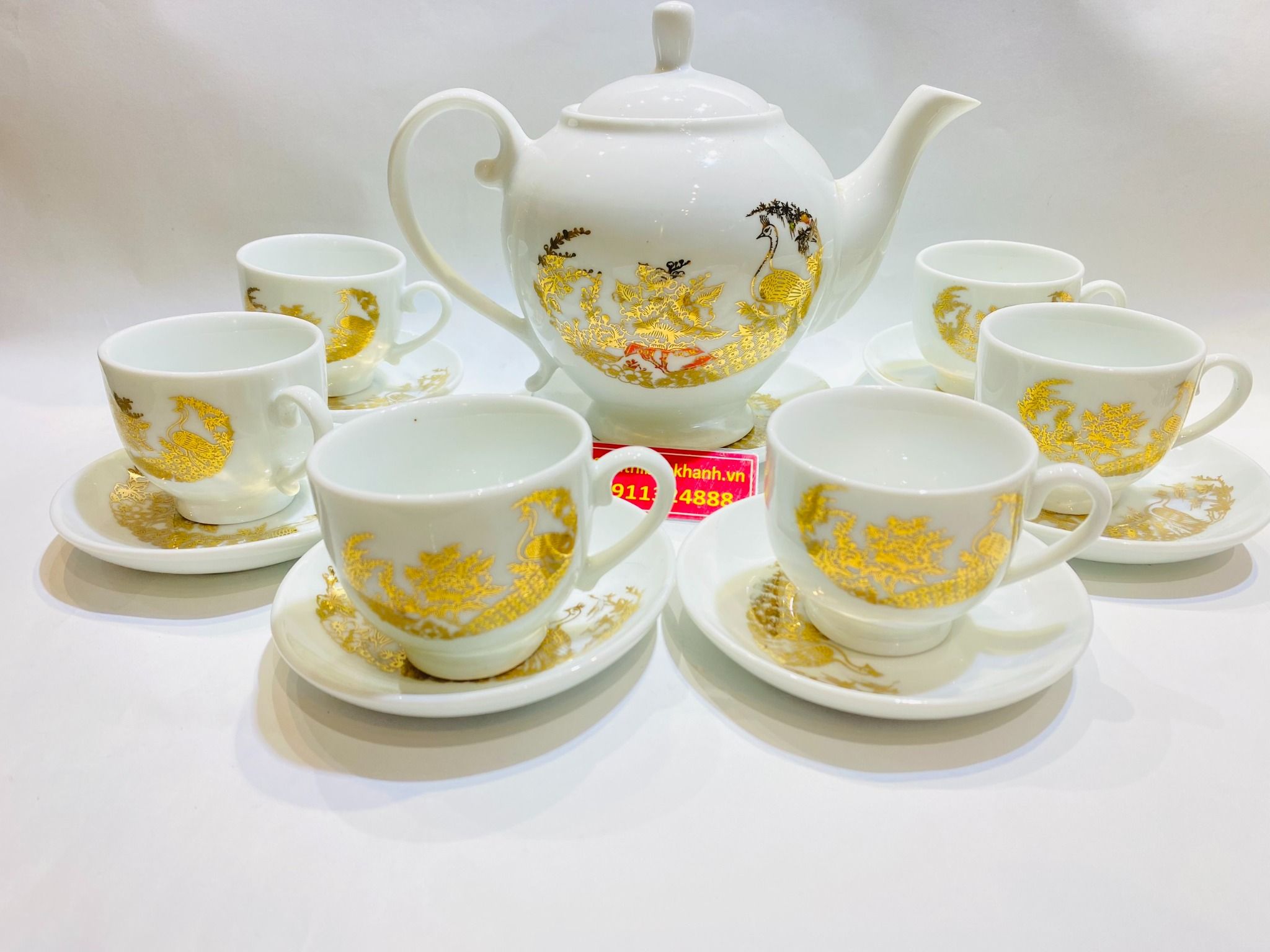 Bộ ấm chén Gốm sứ Bát Tràng men trắng vẽ công