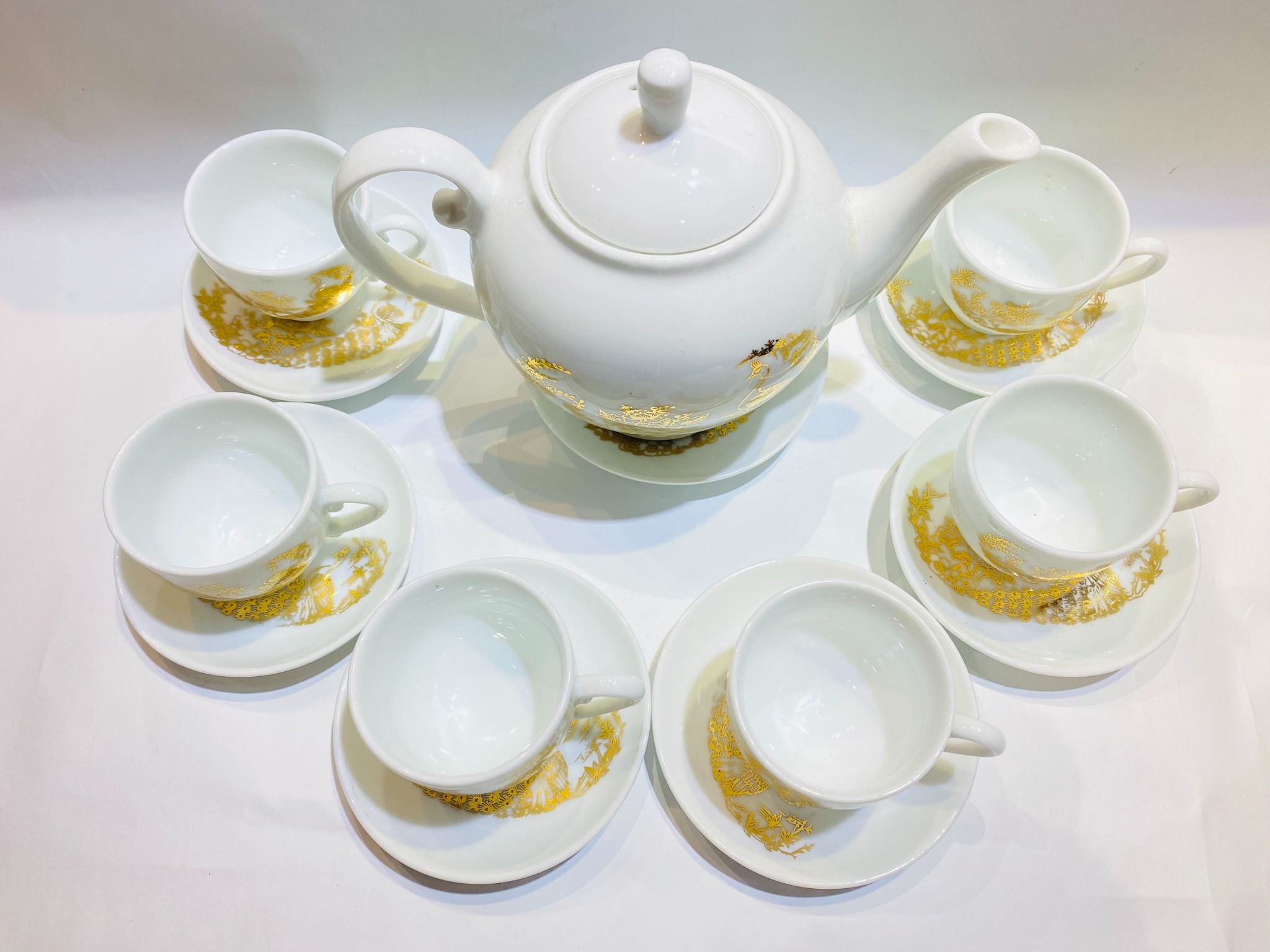 Bộ ấm chén Gốm sứ Bát Tràng men trắng vẽ công