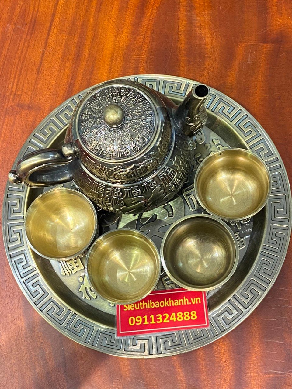 Bộ ấm chén đồng họa tiết nổi