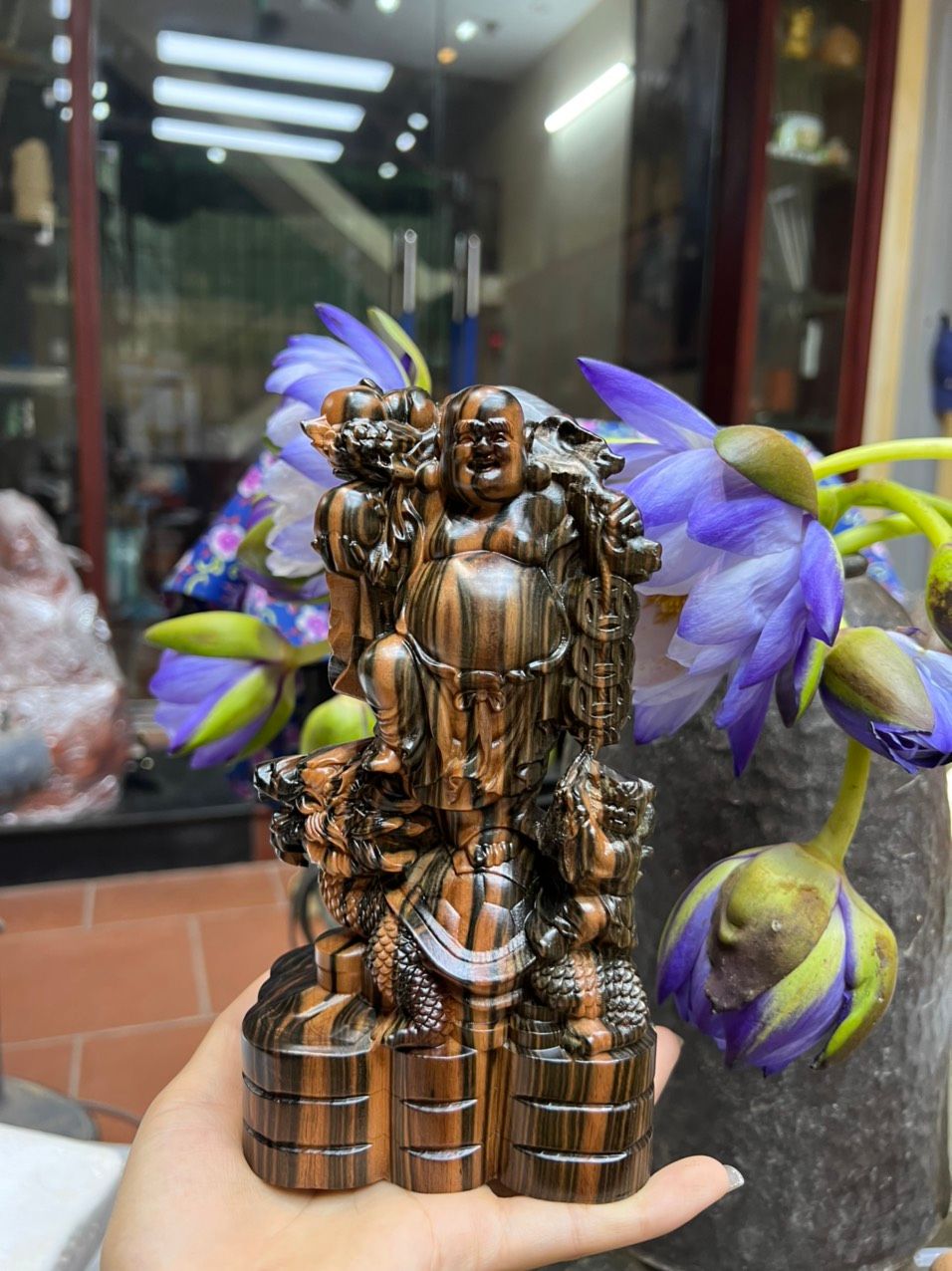 Di lặc đứng long quy mun hoa