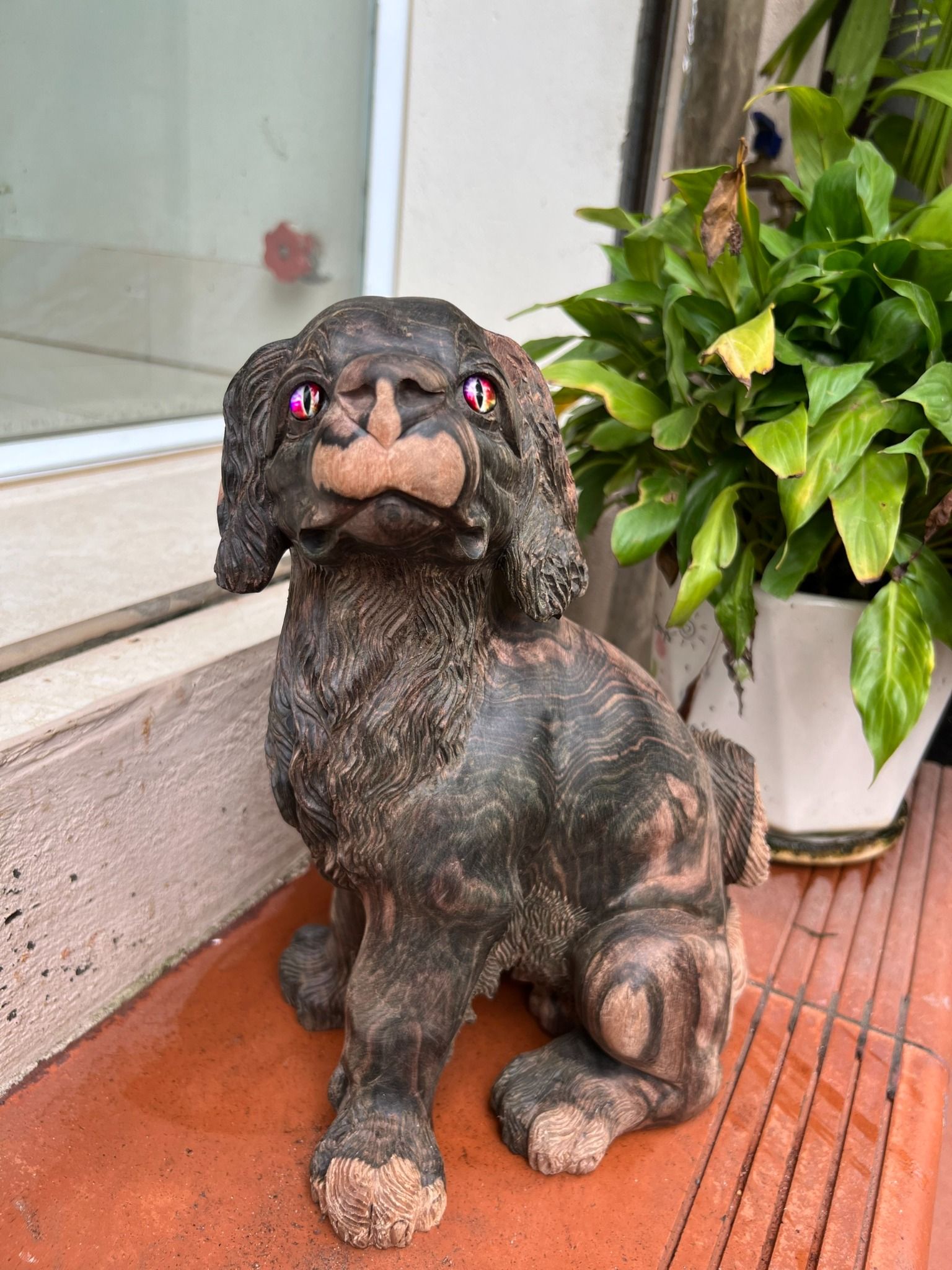 Cún gỗ mun hoa liền khối