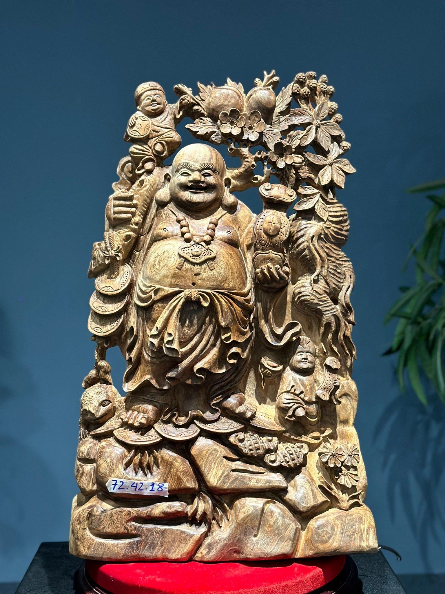Sản Phẩm Di Lặc Gánh Đào Gỗ Ngọc Am