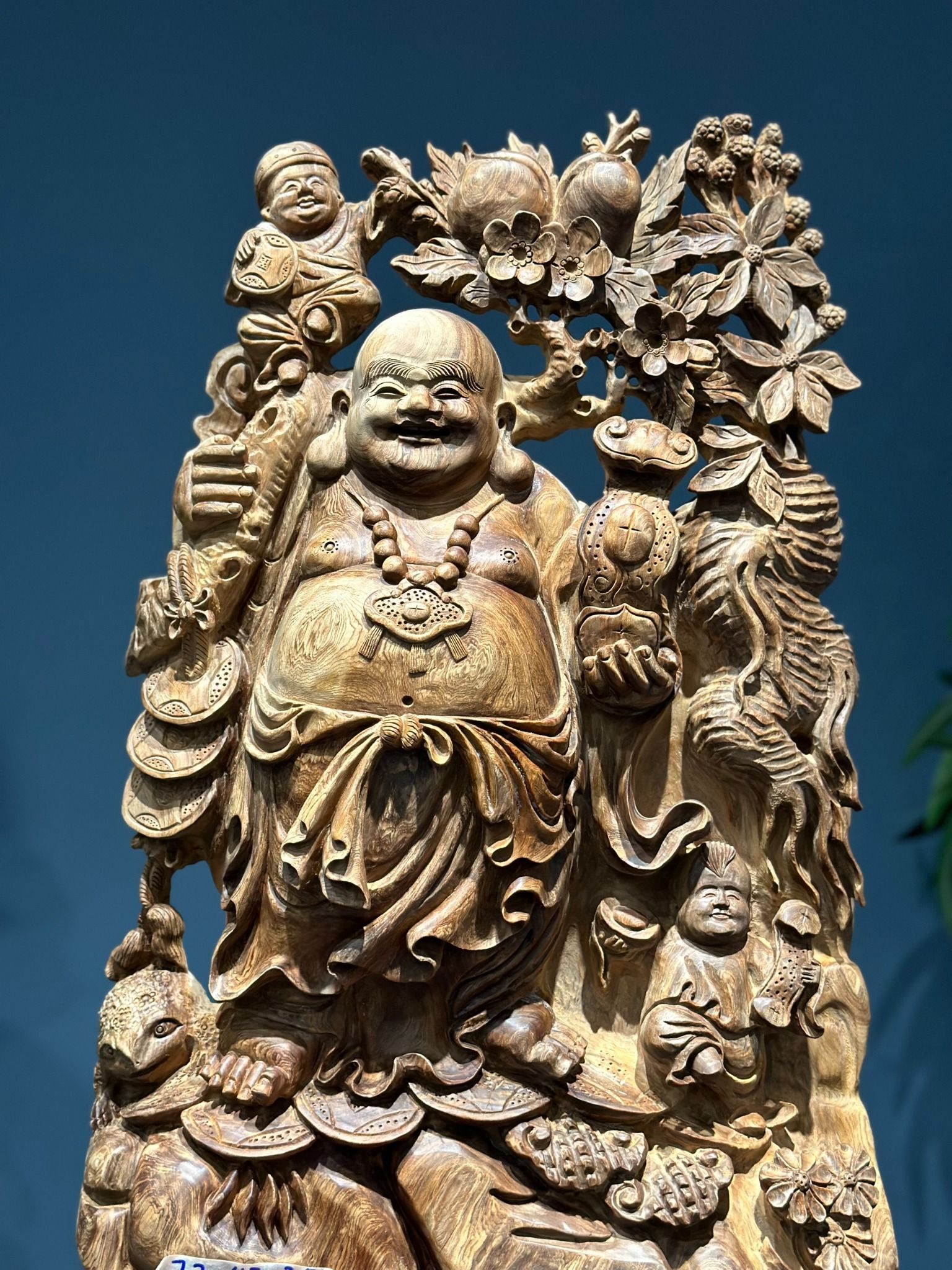 Sản Phẩm Di Lặc Gánh Đào Gỗ Ngọc Am