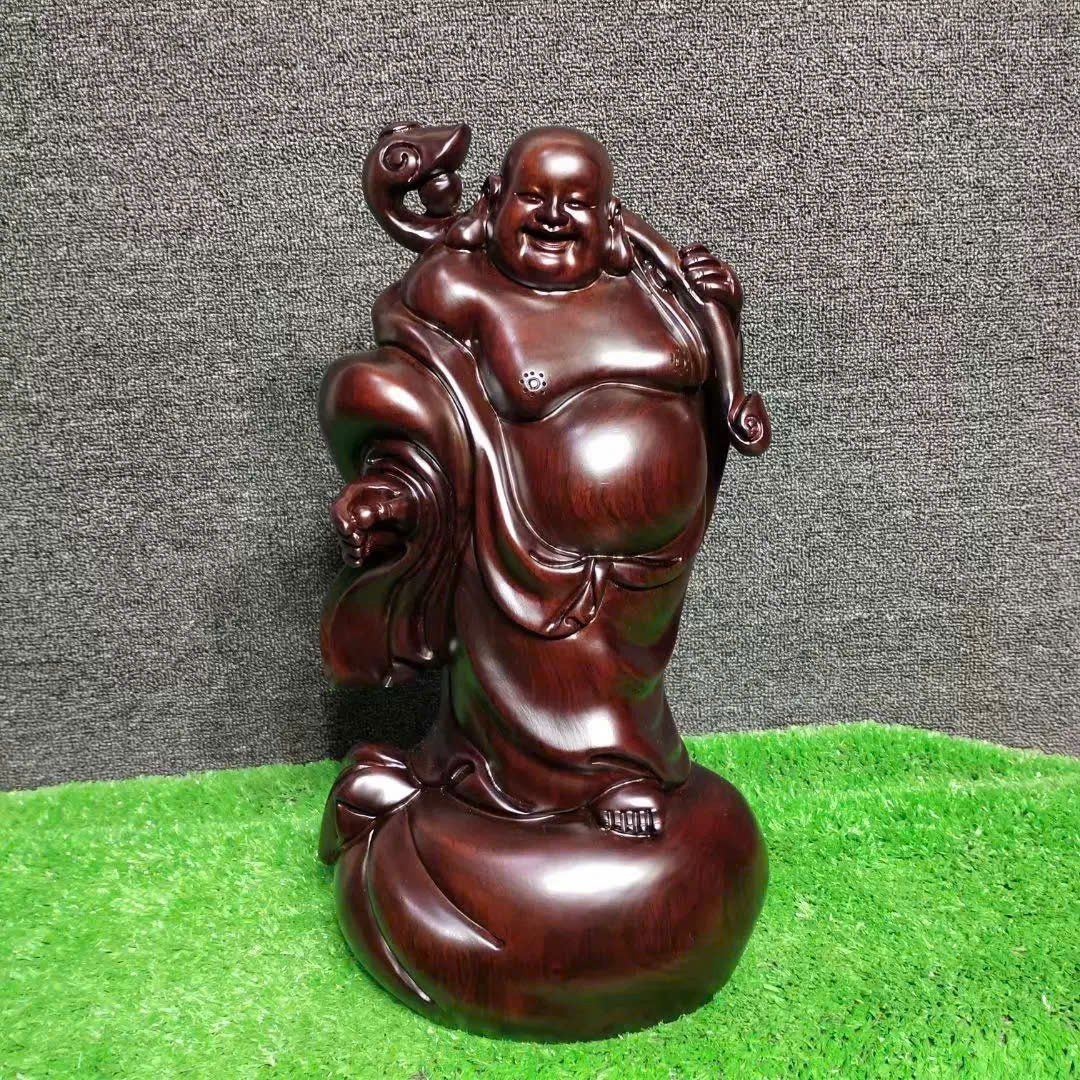 Tượng Phật Di Lặc được chạm khắc bằng gỗ mun