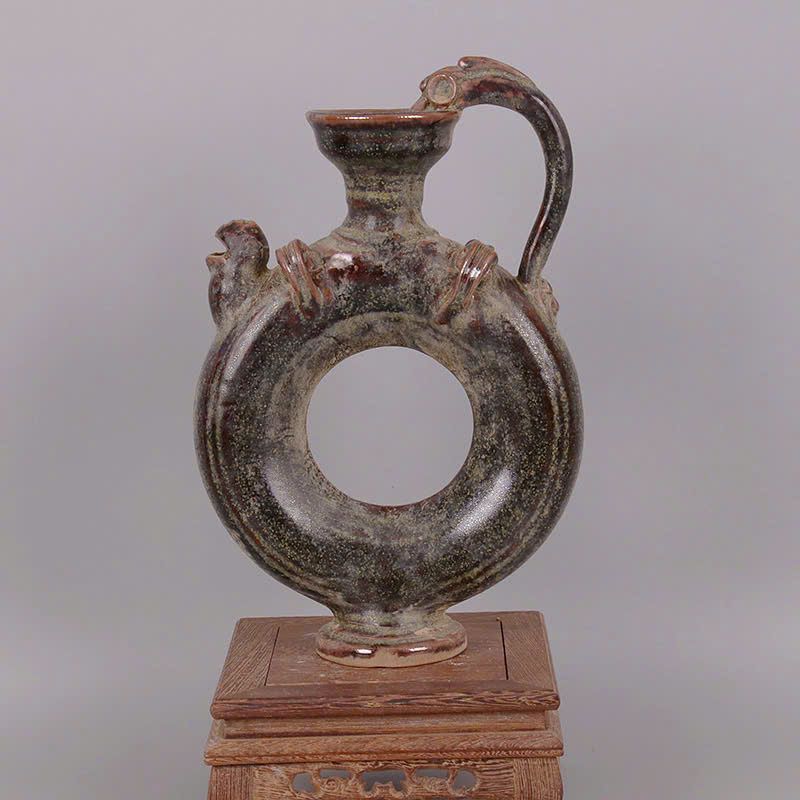 Bình trà đầu gà