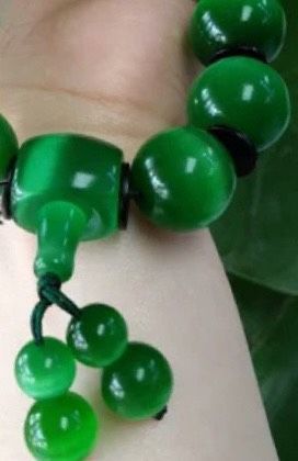 Vòng ngọc xanh Chất liệu đá mắt mèo