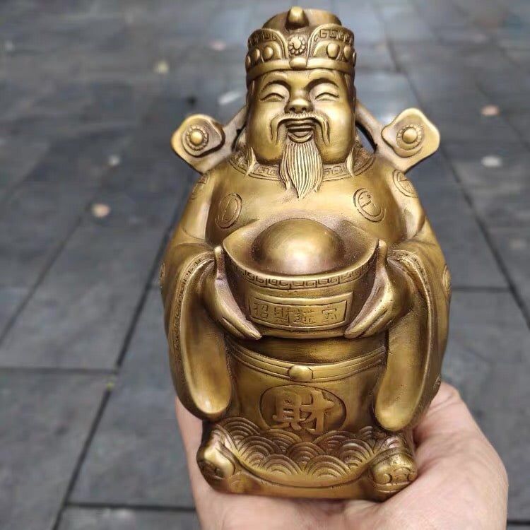 Đồ trang trí Thần tài cầm thỏi vàng