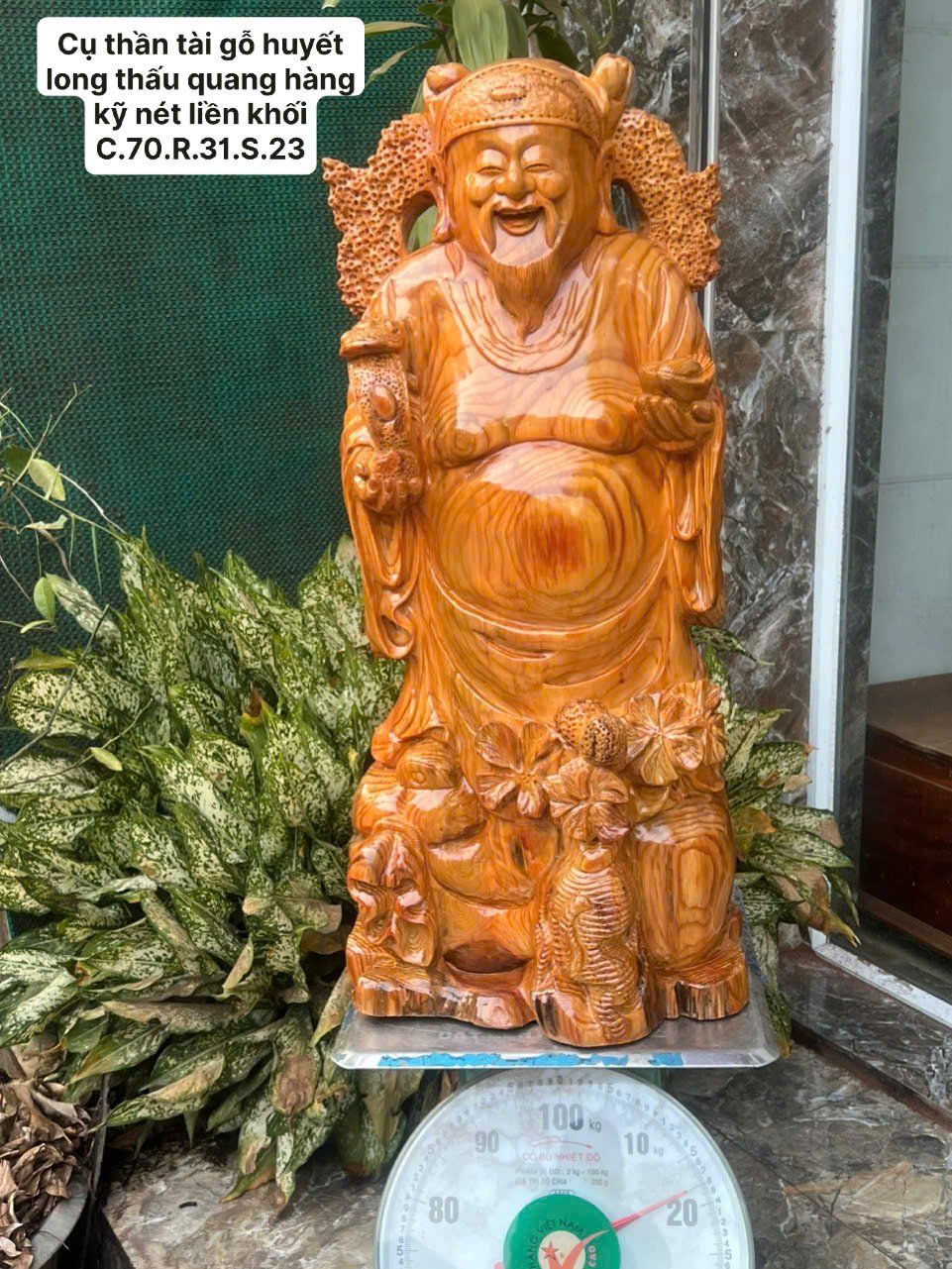 Cụ Thần Tài Gỗ Huyết Long
