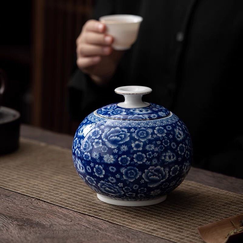 Lon trà sứ trắng xanh
