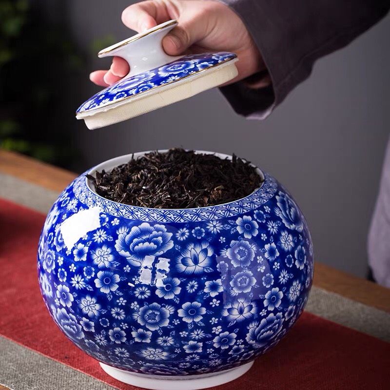 Lon trà sứ trắng xanh