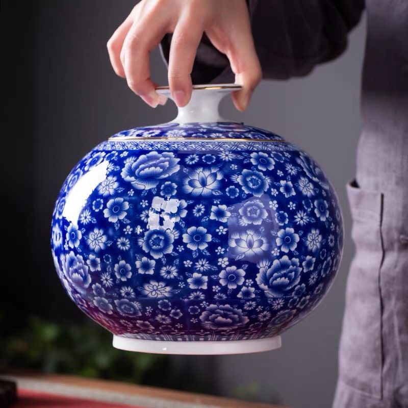 Lon trà sứ trắng xanh