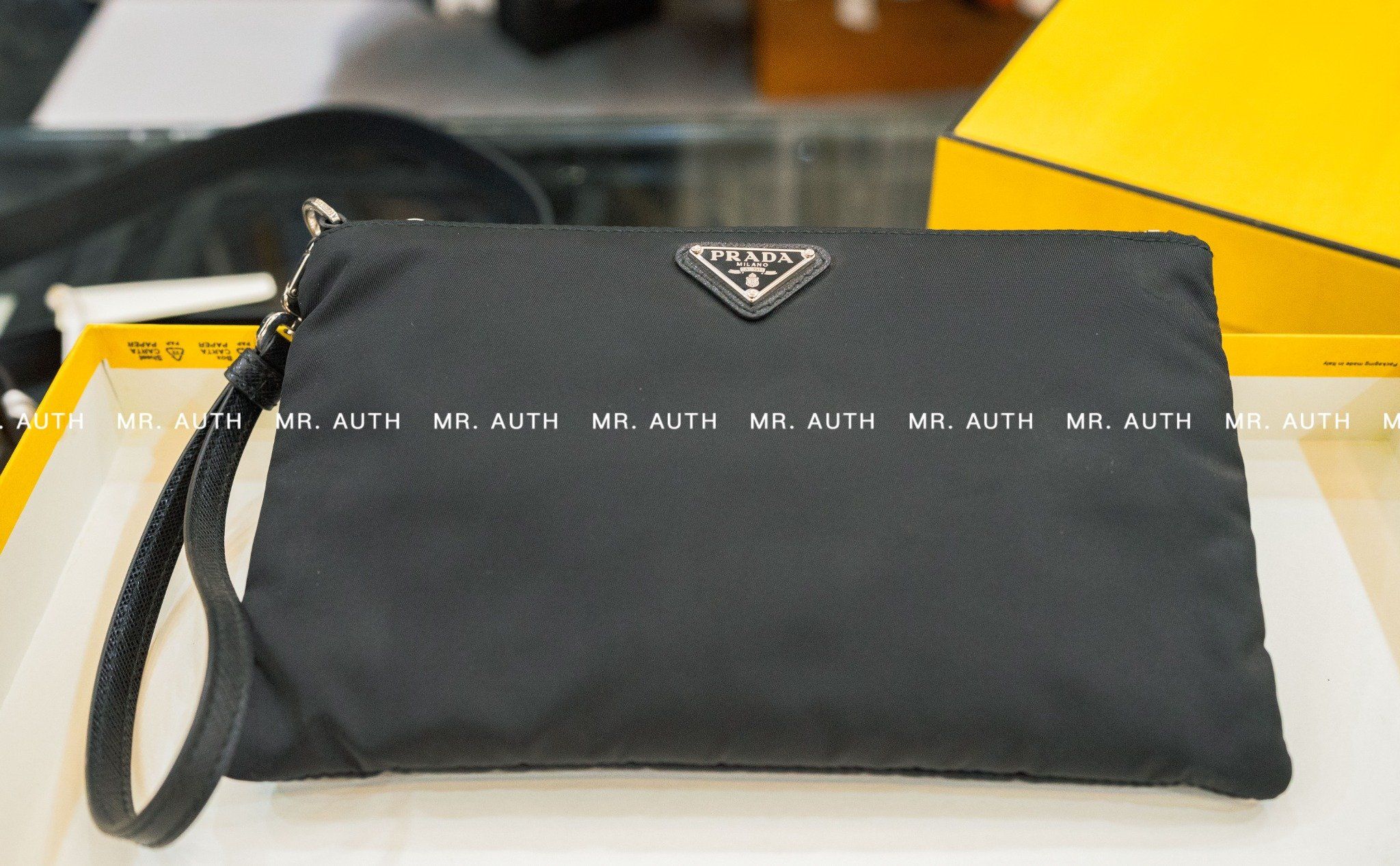 Prada Re-Nylon and Saffiano Leather Pouch.