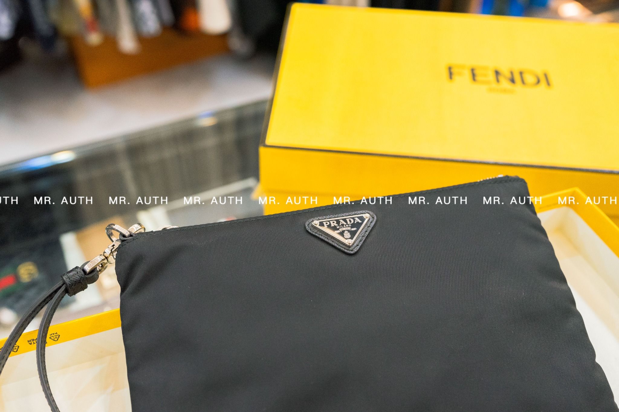 Prada Re-Nylon and Saffiano Leather Pouch.