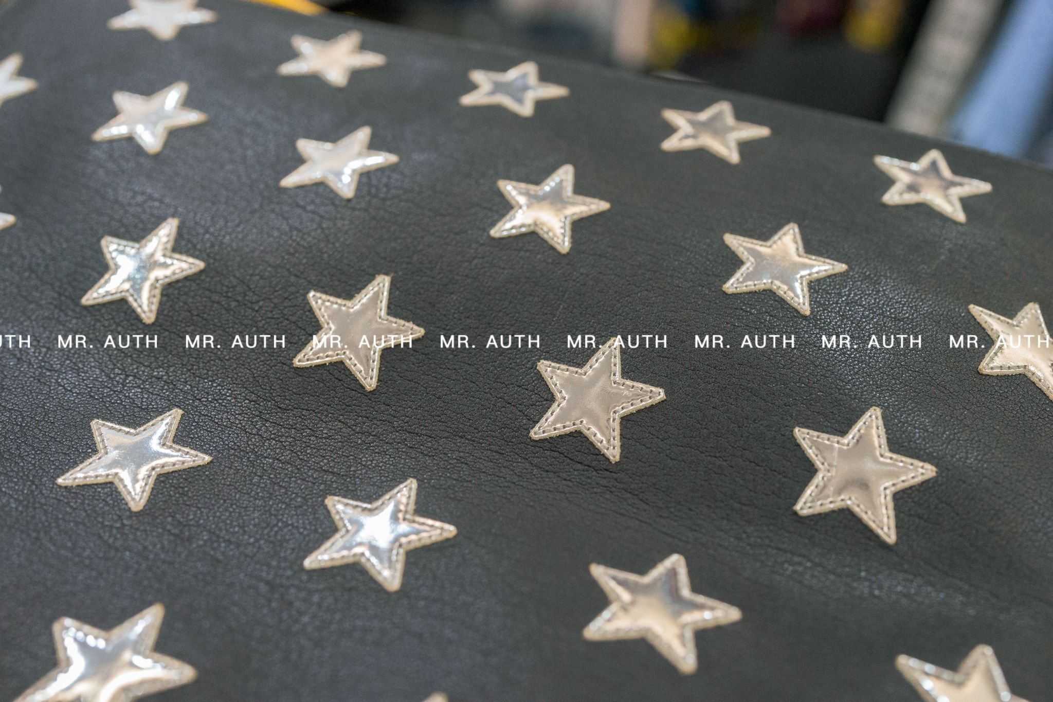 Saint Laurent Star Leather Pouch.
