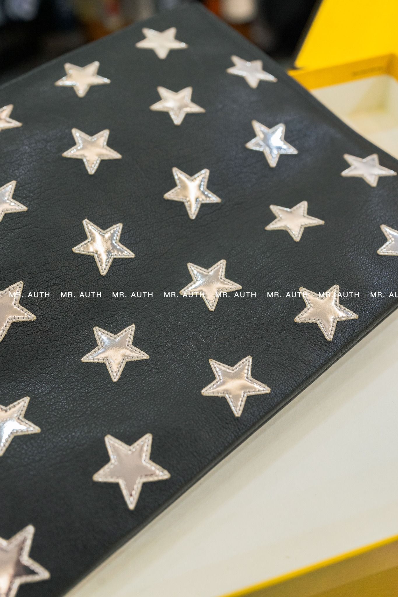 Saint Laurent Star Leather Pouch.