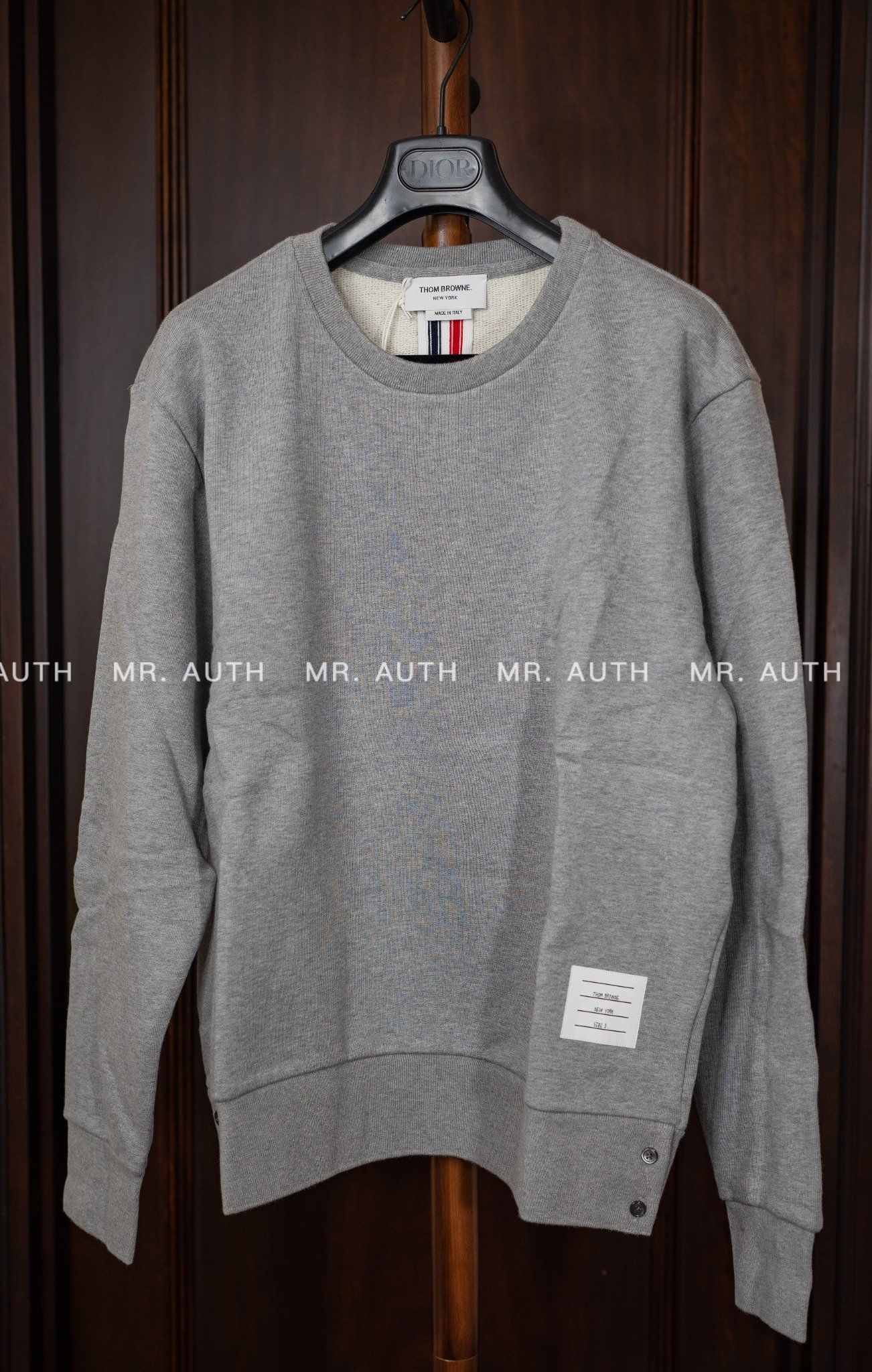 Thom Browne rear RWB stripe sweatshirt.