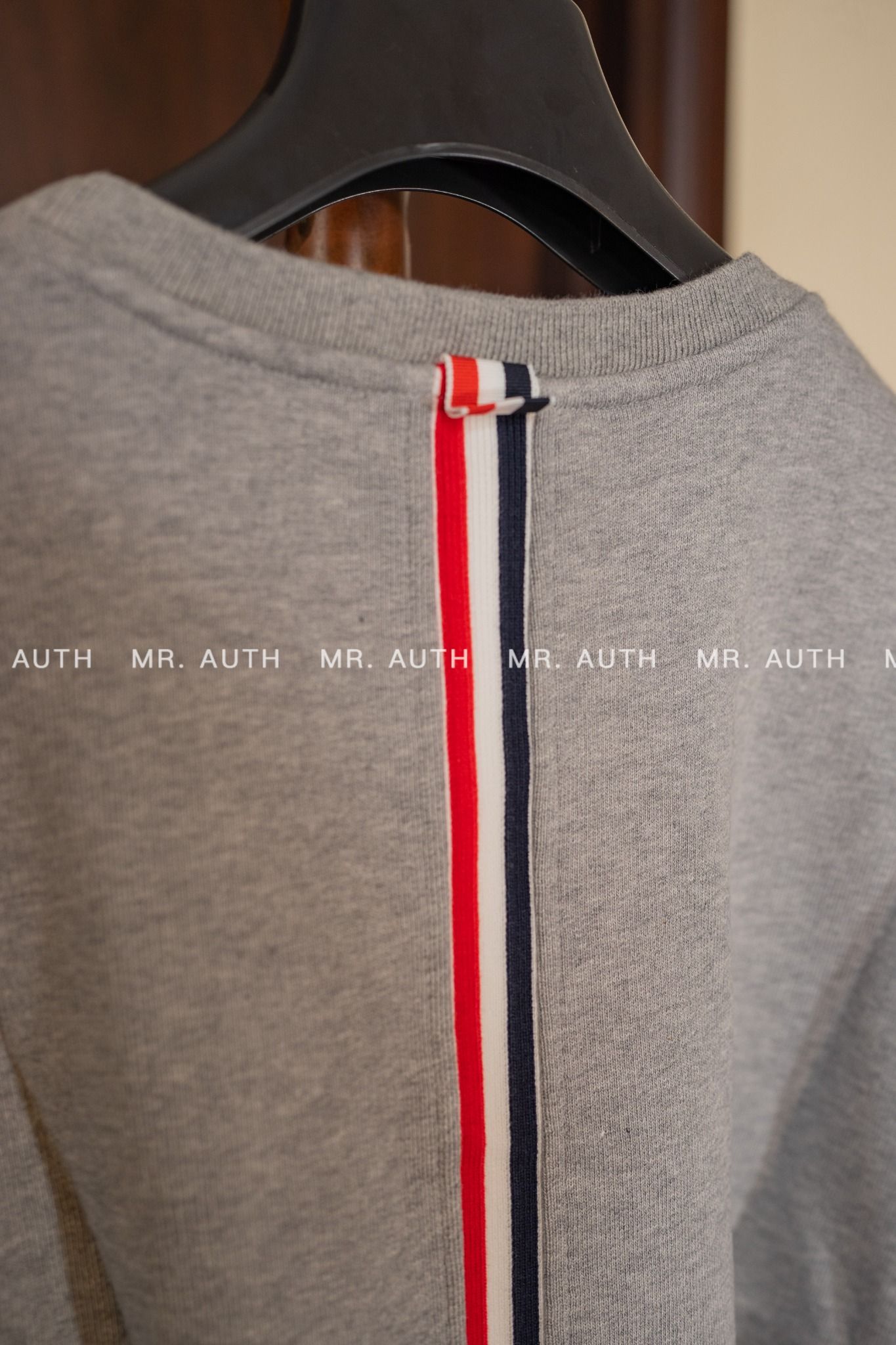 Thom Browne rear RWB stripe sweatshirt.