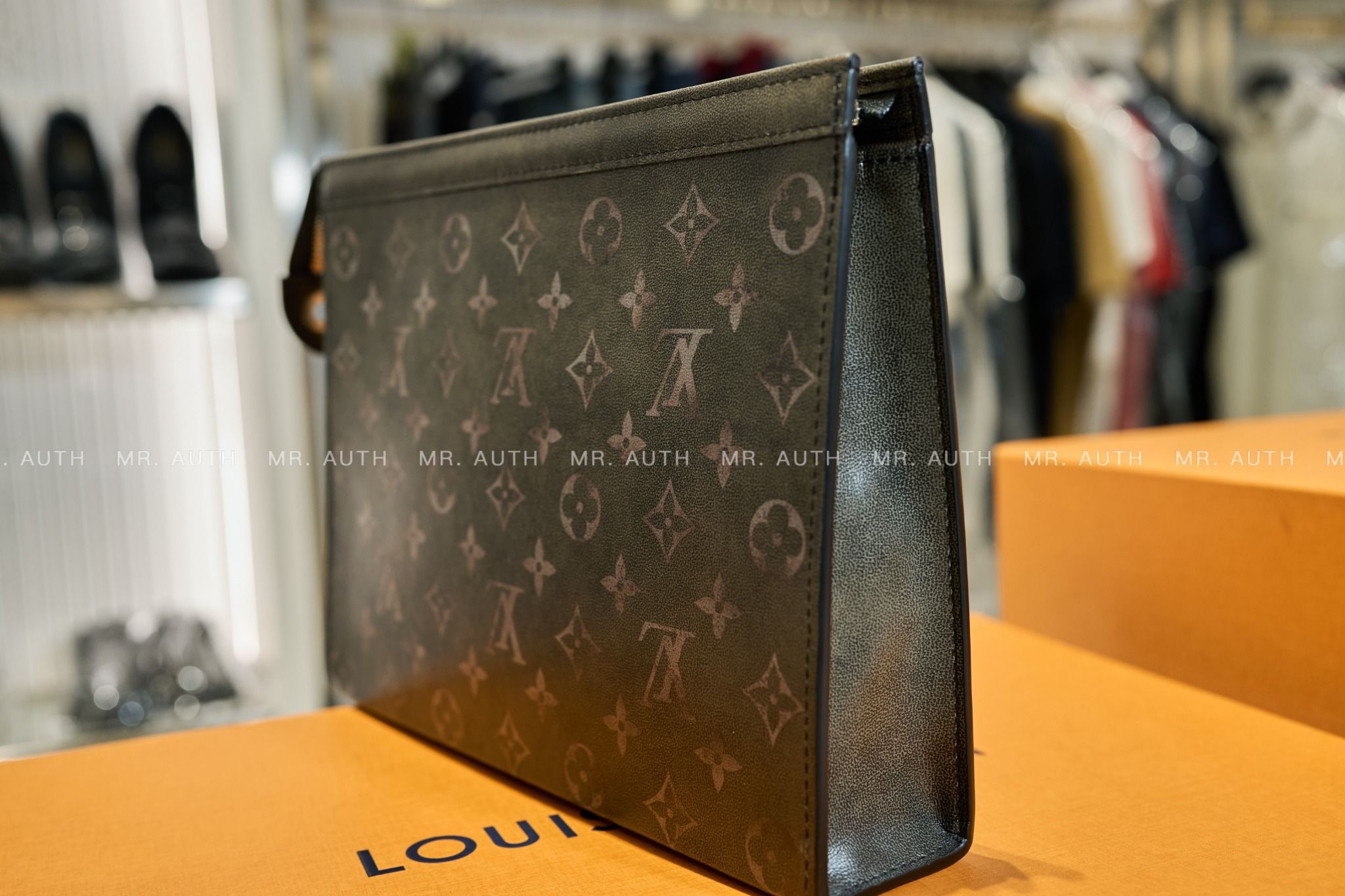 Louis Vuitton Pochette Voyage MM Pouch