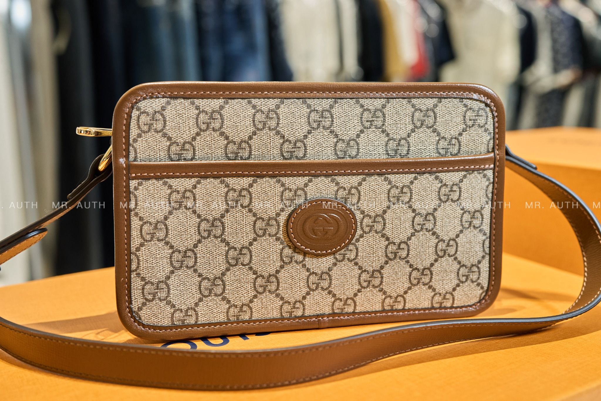 Gucci Mini Interlocking G Messenger Bag.