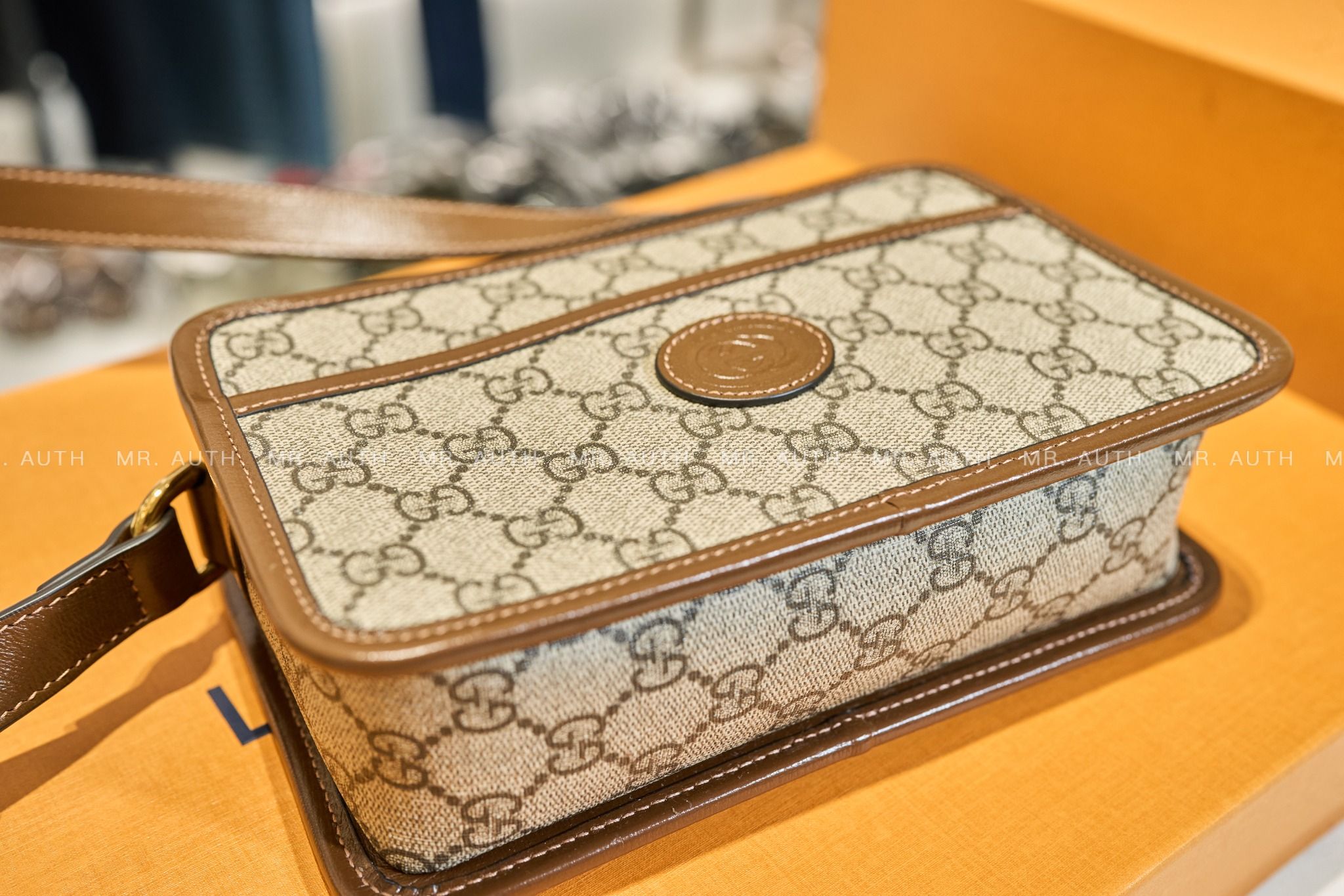 Gucci Mini Interlocking G Messenger Bag.